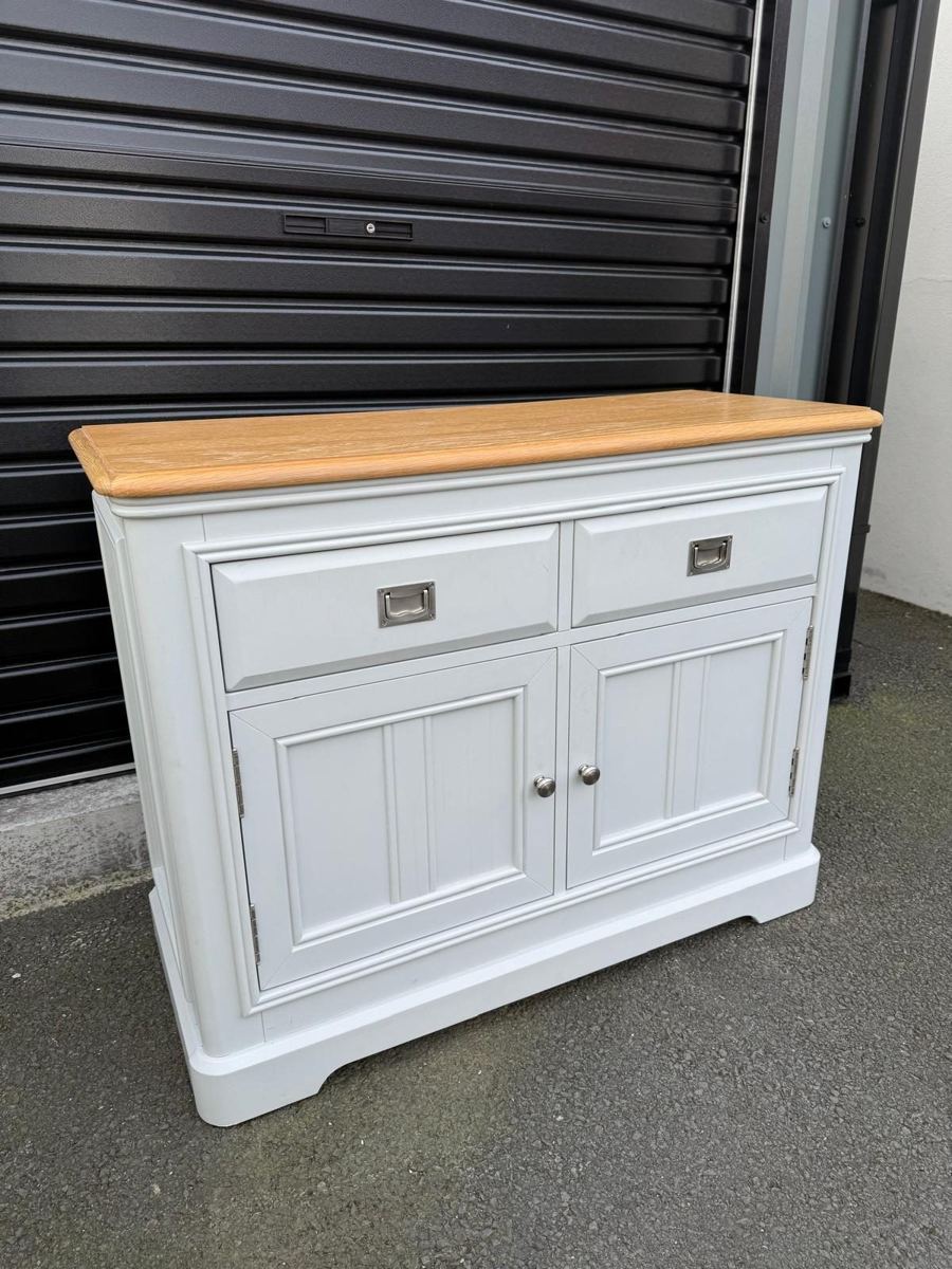 Light grey sideboard with oak top and silver handles